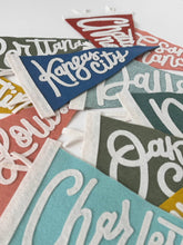 Load image into Gallery viewer, traveldashery - Custom city / state / location pennant: Mix of colors (add details to custom box) / I understand the current lead time for my order